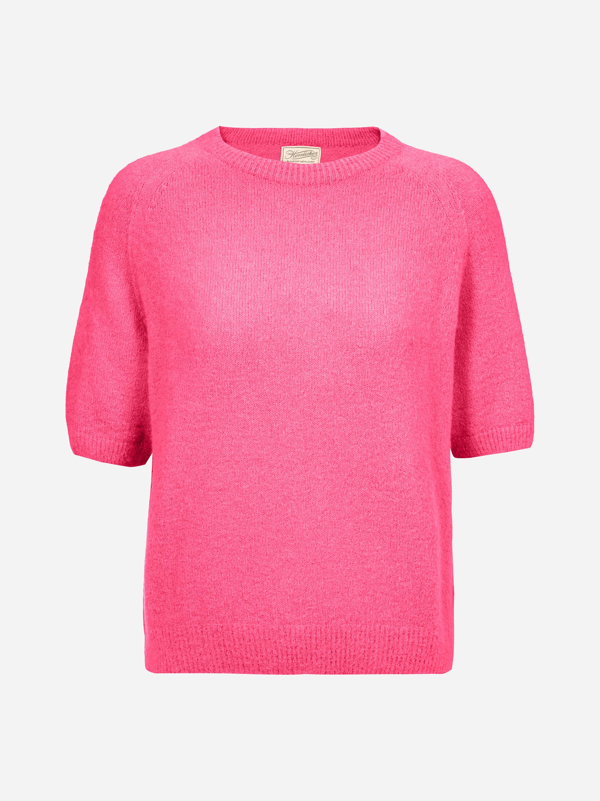 Leuchtend rosafarbener kurzärmeliger Pullover mit Rundhalsausschnitt, geradem Saum und weichem, strukturiertem Strickstoff. Der Pullover ist vor einem schlichten weißen Hintergrund abgebildet.