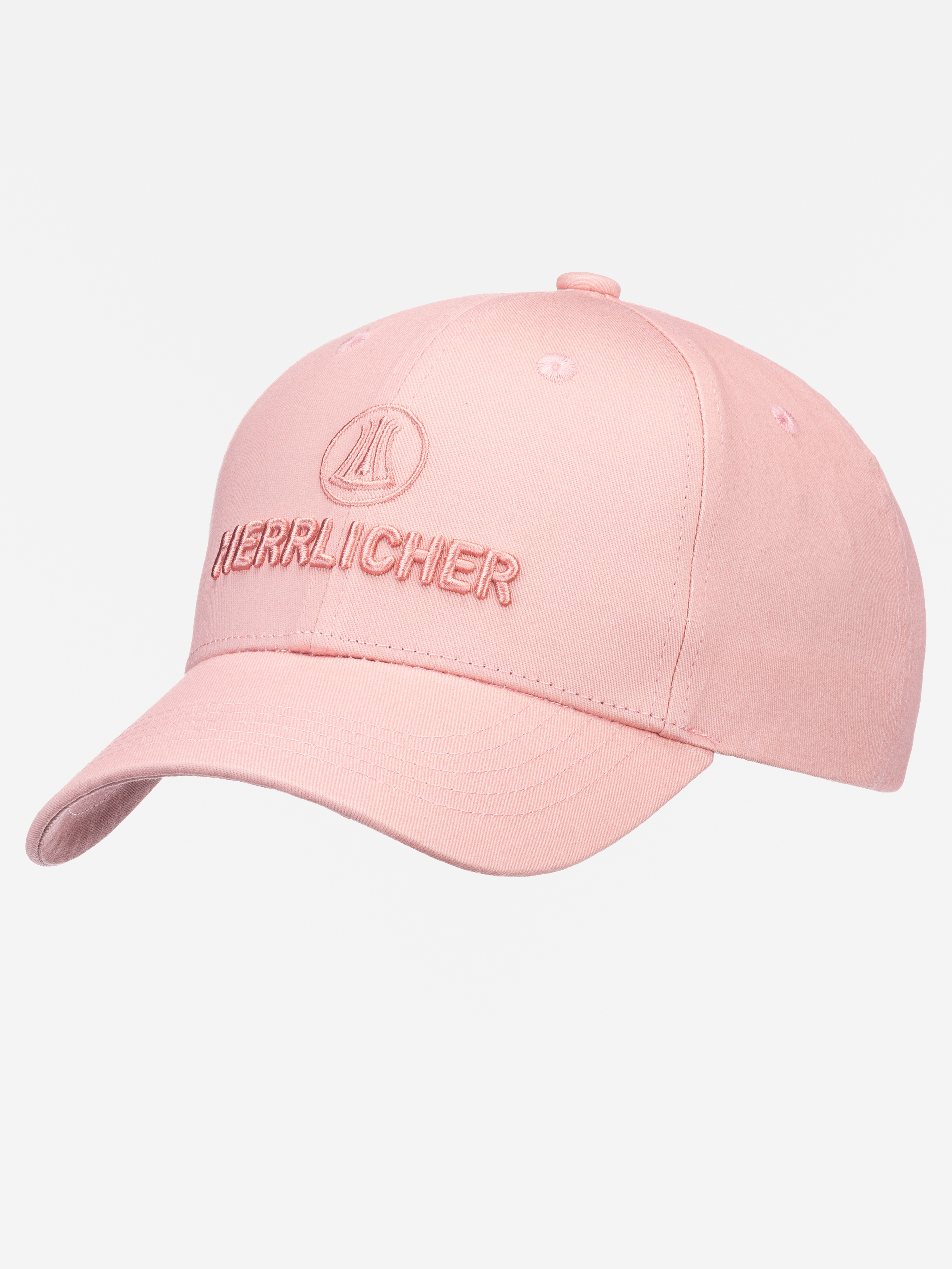 Eine hellrosa Baseballkappe mit gebogenem Rand, die auf der Vorderseite den Schriftzug HERRLICHER und ein kreisförmiges Logo in passendem rosa Garn aufgestickt hat.