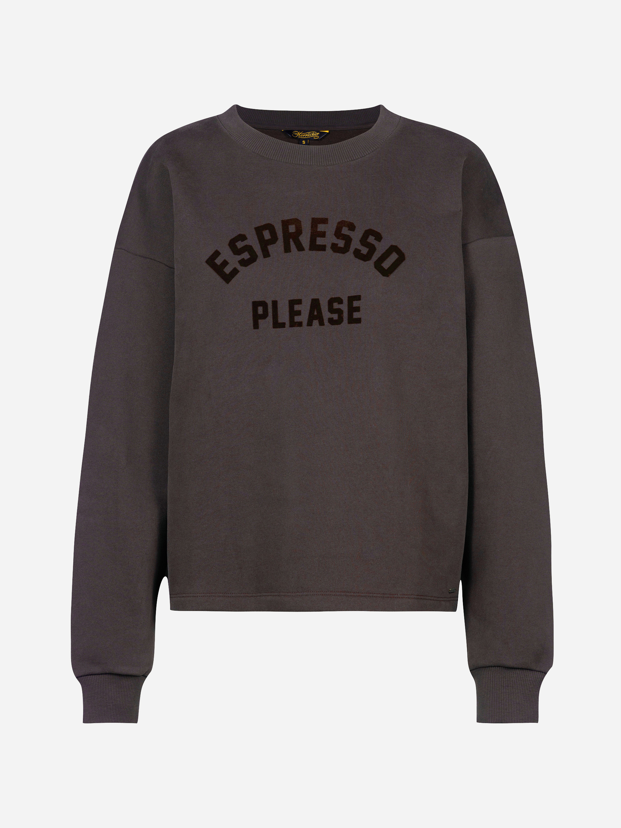 Ein dunkelgraues Sweatshirt mit der Aufschrift „ESPRESSO PLEASE“ in fetten schwarzen Buchstaben quer über der Brust. Das Sweatshirt hat lange Ärmel sowie gerippte Bündchen an den Ärmeln und am Saum.