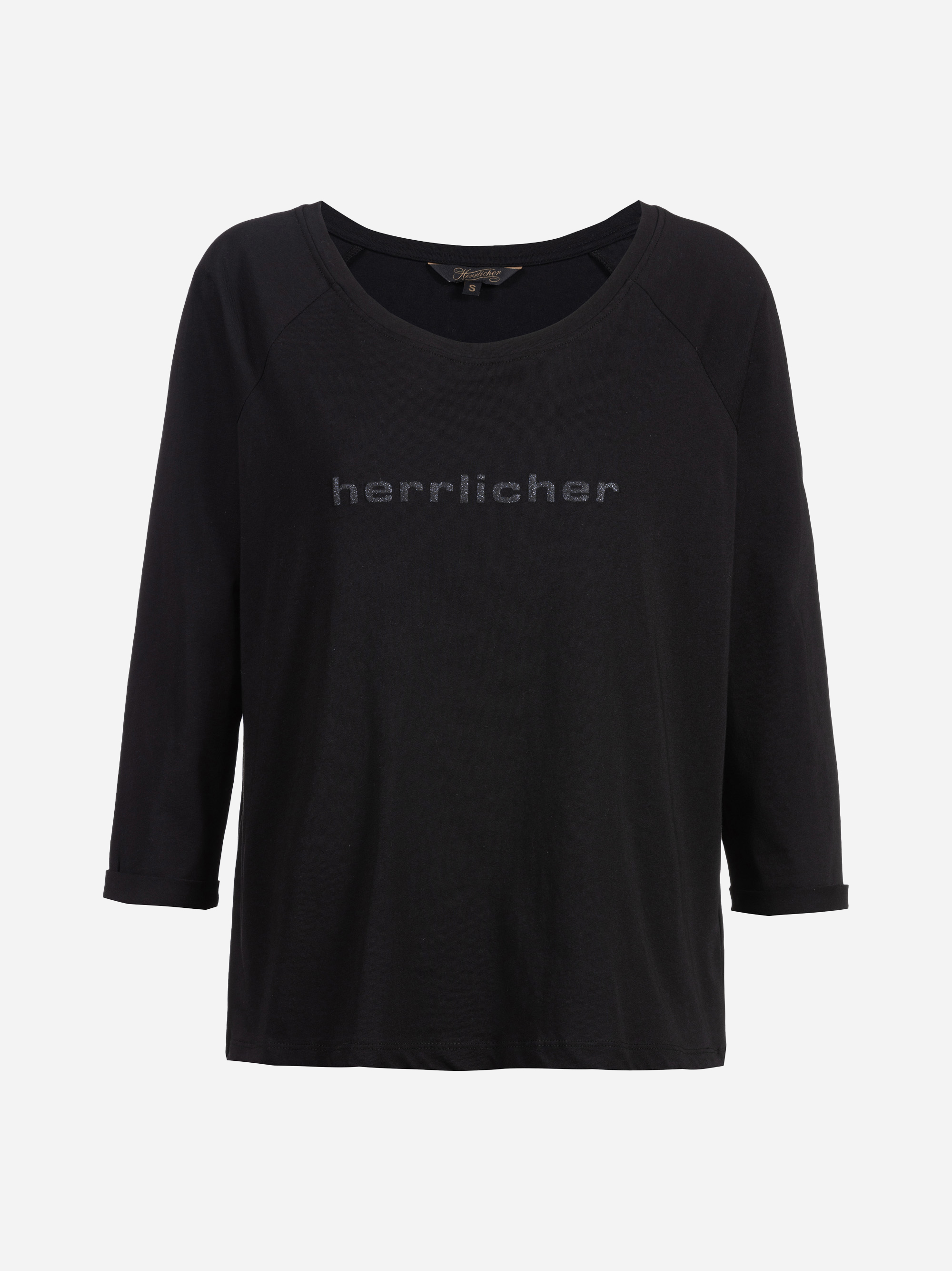 Schwarzes, langärmeliges T-Shirt mit dem Aufdruck "herrlicher" in dezenter, dunkler Schrift auf der Brust. Das Shirt hat einen weiten, runden Ausschnitt und eine lockere Passform.