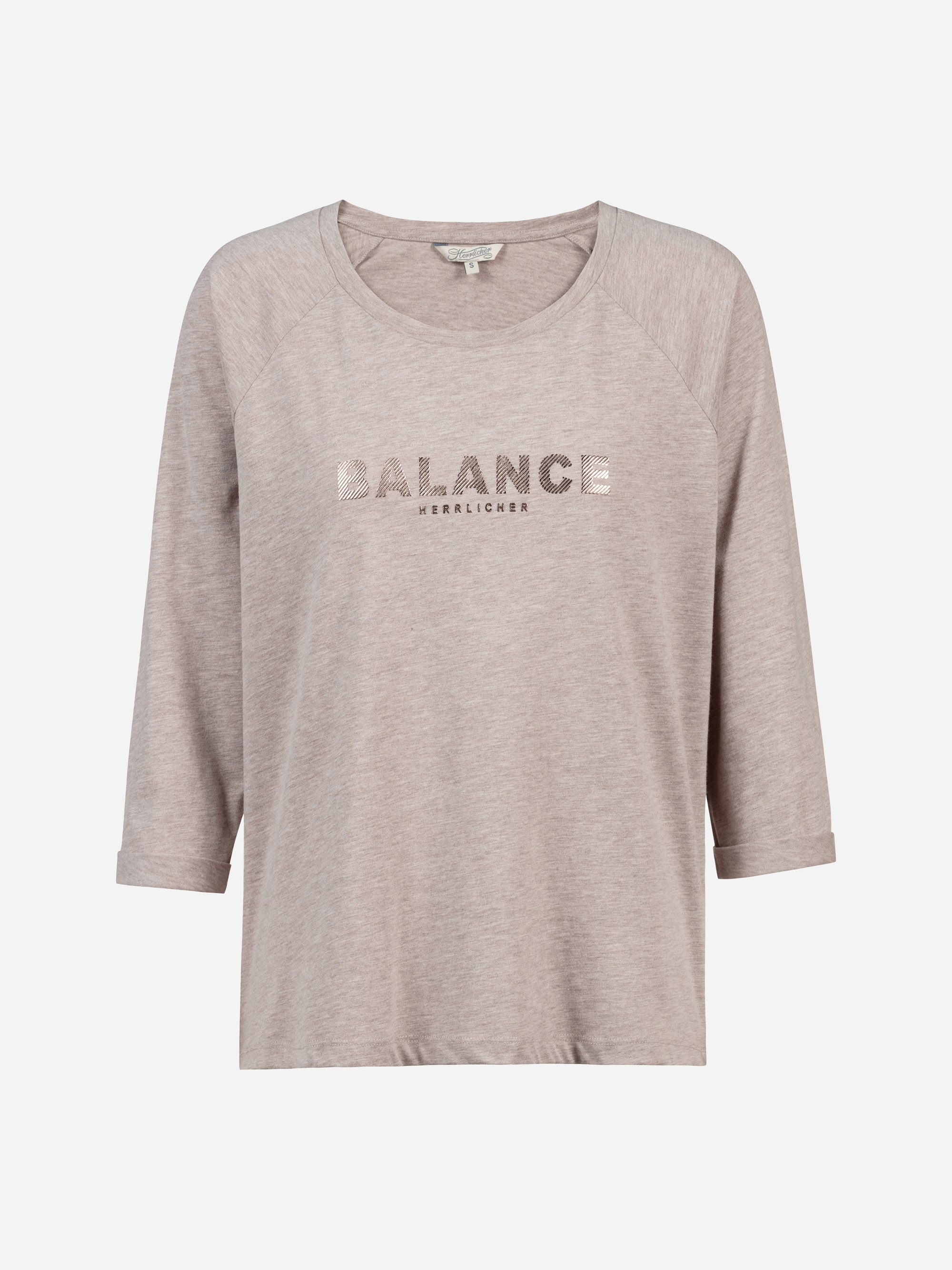 Hellbeiges, dreiviertelärmeliges Damenshirt mit BALANCE und WIRKLICHER in metallischen Buchstaben auf der Brust. Das Shirt hat eine lockere Passform und einen Rundhalsausschnitt.