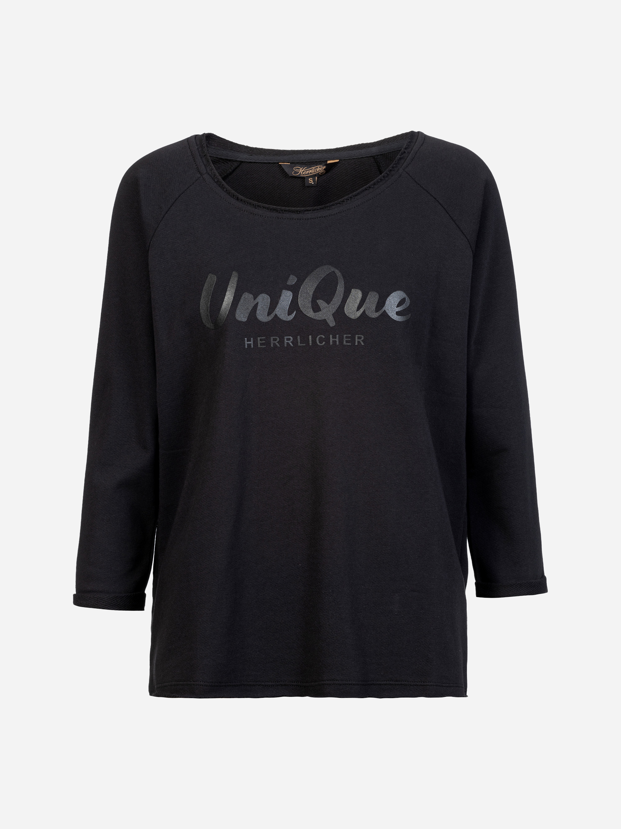 Ein schwarzes langärmeliges Hemd mit dem Wort UniQue in großen, glänzenden Buchstaben und HERRLICHER in kleineren Buchstaben darunter, zentriert auf der Brust. Das Hemd ist auf einem schlichten weißen Hintergrund abgebildet.