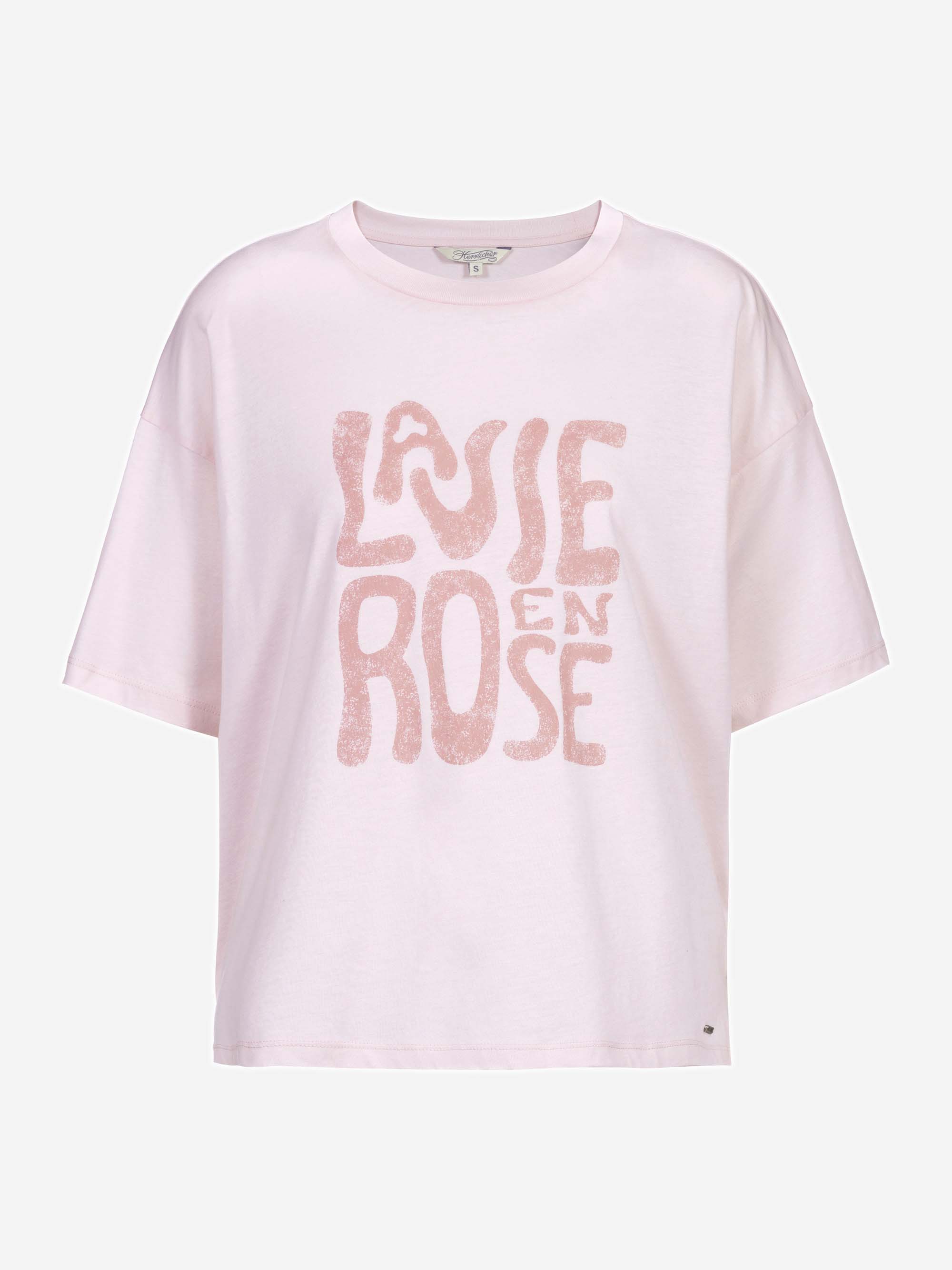 Ein hellrosa Kurzarm-T-Shirt mit dem Schriftzug LA VIE EN ROSE in großen, glitzernden rosafarbenen Buchstaben auf der Vorderseite, der sich von einem schlichten weißen Hintergrund abhebt.