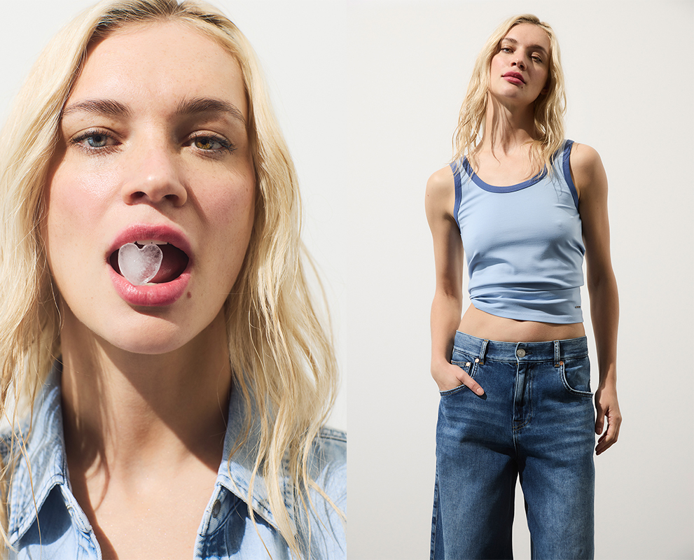Links ist eine Frau mit blonden Haaren zu sehen, die einen Eiswürfel im Mund hält, und rechts steht sie in einem hellblauen Trägertop und blauen Jeans, die Hände in den Taschen, und posiert vor einem schlichten Hintergrund.